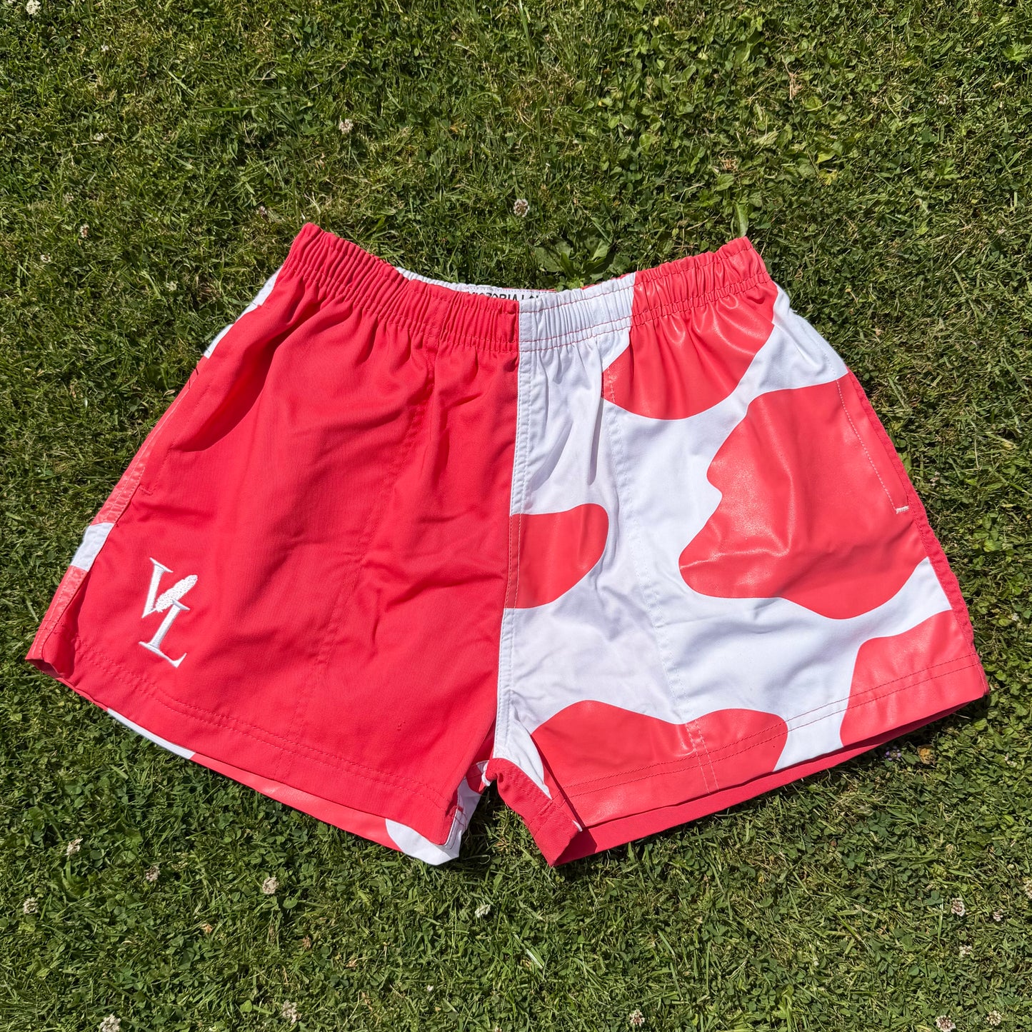 Raspberry Cow Print Zipped Pocket Shorts